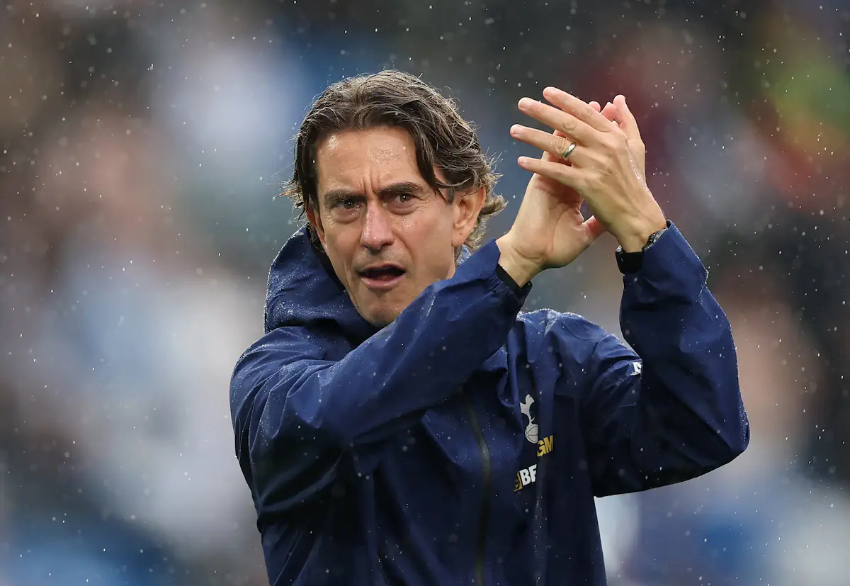 Thomas Frank applauds the Leeds United supporters