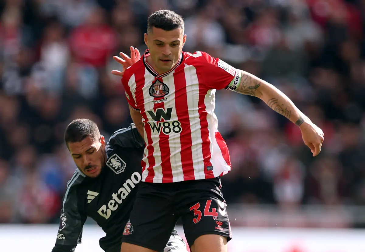 Sunderland's Granit Xhaka battles with Aston Villa's Emi Buendia for the ball