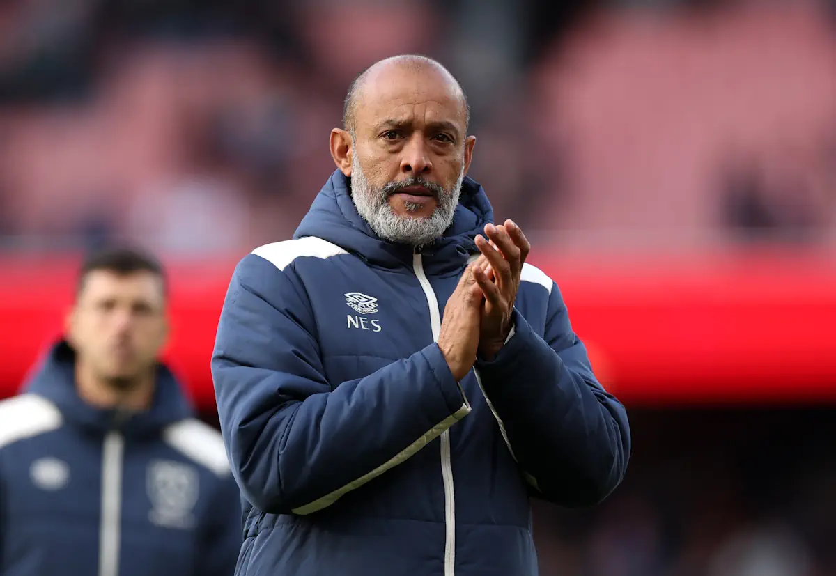 Nuno Espirito Santo applauds the West Ham United fans at the end of a game